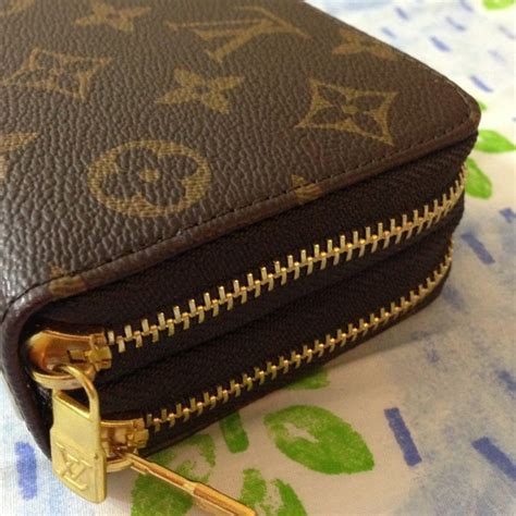 louis vuitton double zipper wallet.